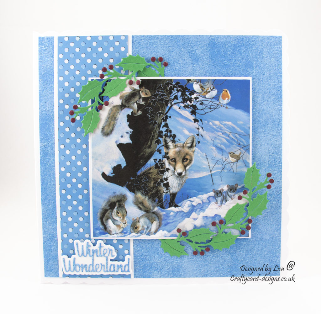 handmade card has been created using Pollyanna Pickering 'A Winters Tale' dvd-rom by Creative Crafting World.