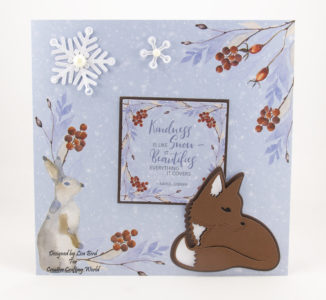 Christmas card on a printed card with a fox and snow flakes
