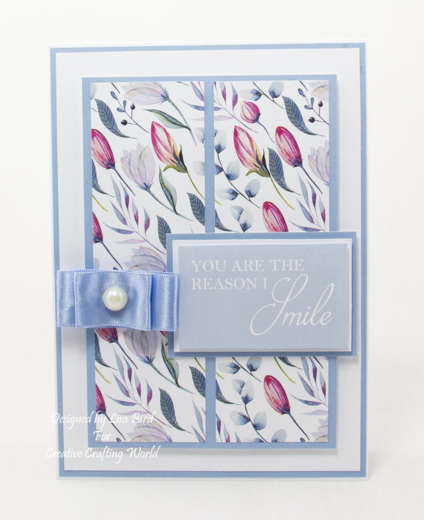 handmade card has been created using a Paper Boutique paper collection from Creative Crafting World called Floral Daze