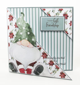 handmade card has been created using a Paper Boutique paper collection from Creative Crafting World called Winter Gnomes
